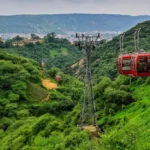 Infrastructure development in the Aravalli region highlights concerns that the Aravalli forests 100-metre rule could weaken ecological protection and open fragile landscapes to construction.Infrastructure development in the Aravalli region highlights concerns that the Aravalli forests 100-metre rule could weaken ecological protection and open fragile landscapes to construction.